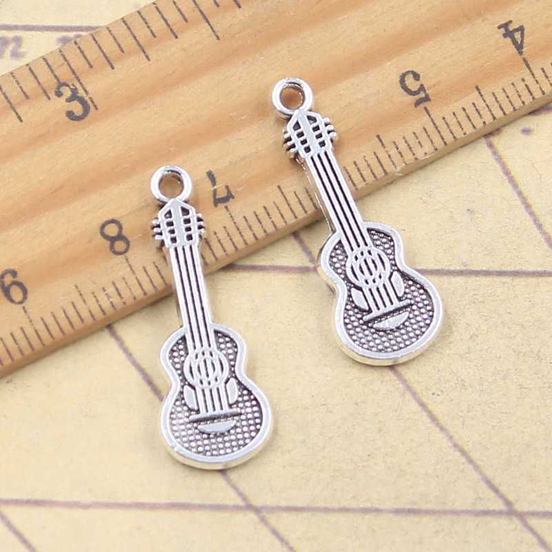 20 個チャーム楽器バイオリンギター 27 × 10 ミリメ - Musical Instrument Like Guitar のレビューと価格